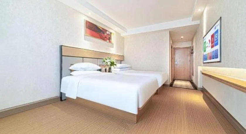 Bed in GreenTree Inn Geermu Walking Street Business Hotel