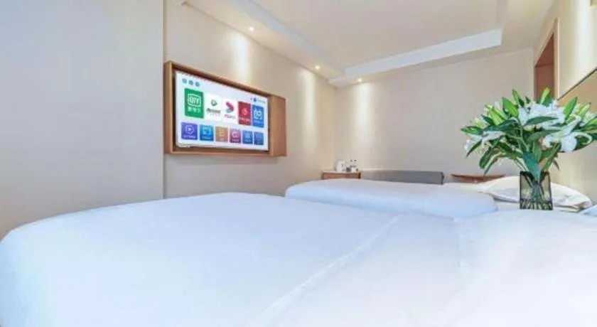 Bed in GreenTree Inn Geermu Walking Street Business Hotel