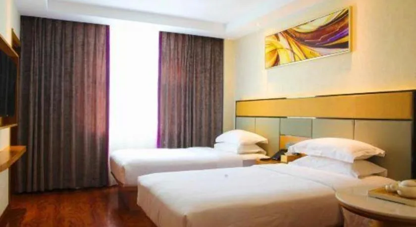 Bed in GreenTree Inn Geermu Walking Street Business Hotel