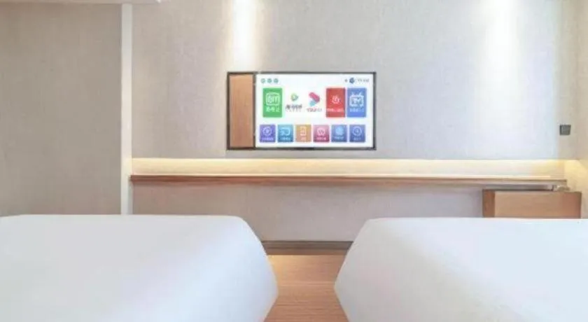 Bed in GreenTree Inn Geermu Walking Street Business Hotel