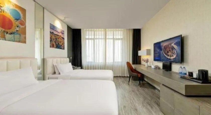 Bed in Jinjiang Metropolo Hotel Shenyang Country Garden Datong Lake Subway Station Branch