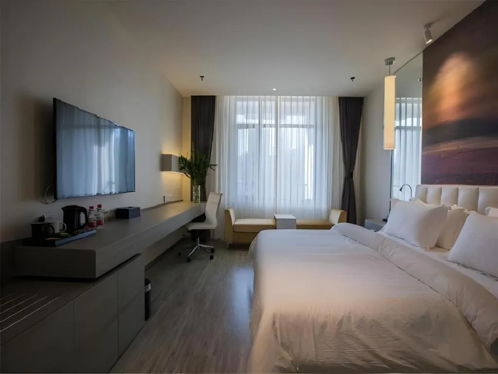 Bed in Jinjiang Metropolo Hotel Shenyang Country Garden Datong Lake Subway Station Branch