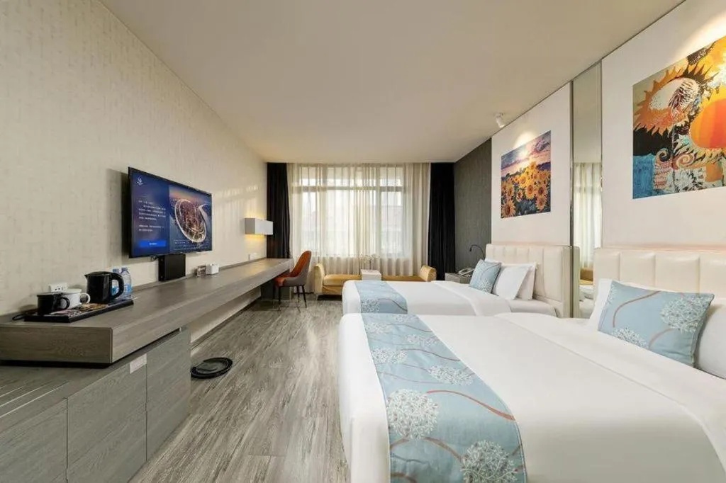 Bed in Jinjiang Metropolo Hotel Shenyang Country Garden Datong Lake Subway Station Branch