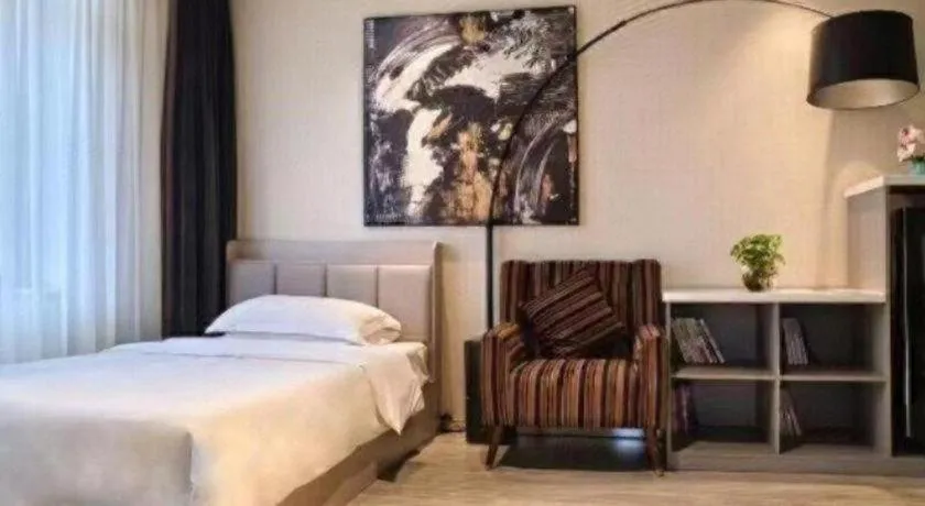 Bed in Jinjiang Metropolo Hotel Shenyang Country Garden Datong Lake Subway Station Branch