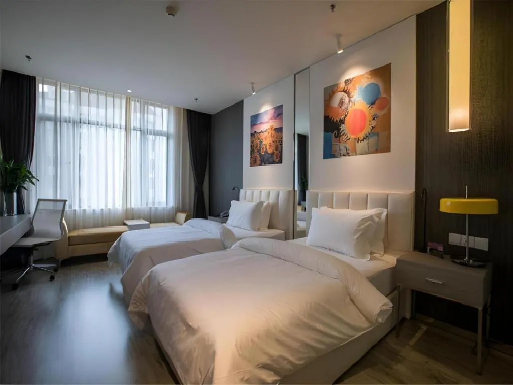 Bed in Jinjiang Metropolo Hotel Shenyang Country Garden Datong Lake Subway Station Branch