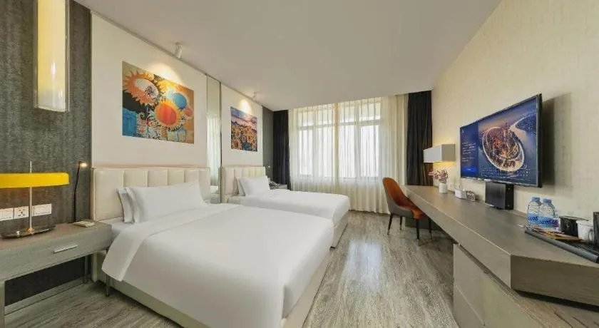 Bed in Jinjiang Metropolo Hotel Shenyang Country Garden Datong Lake Subway Station Branch