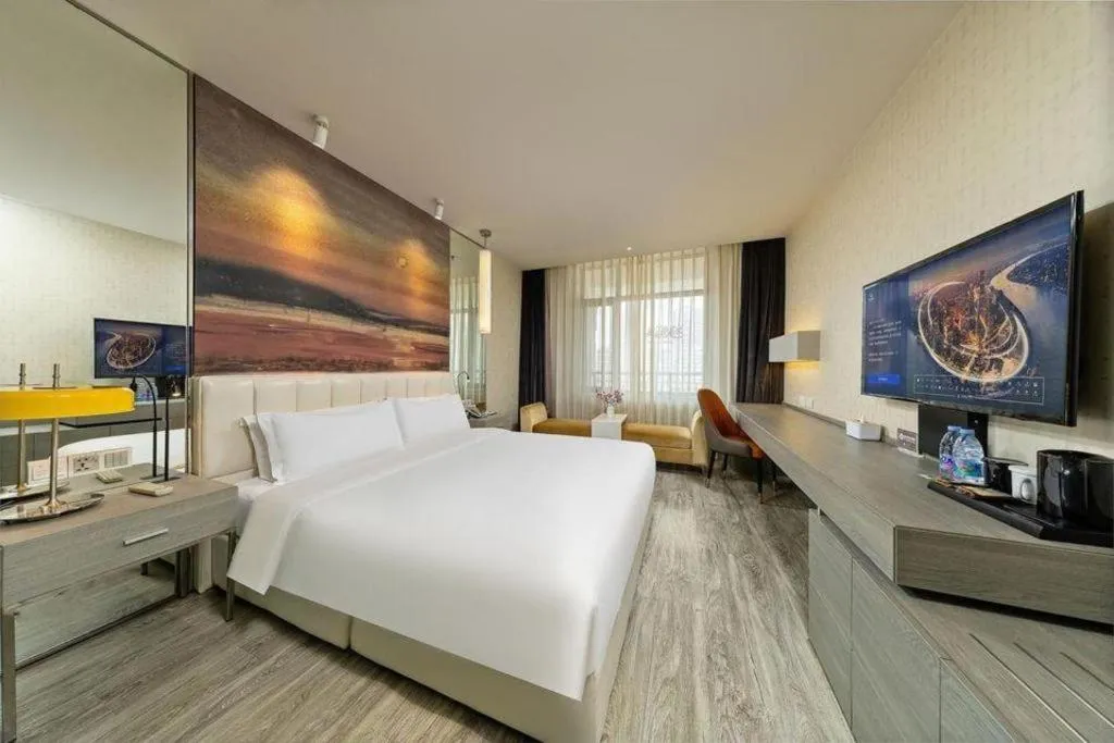 Bed in Jinjiang Metropolo Hotel Shenyang Country Garden Datong Lake Subway Station Branch