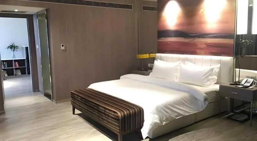 Bed in Jinjiang Metropolo Hotel Shenyang Country Garden Datong Lake Subway Station Branch