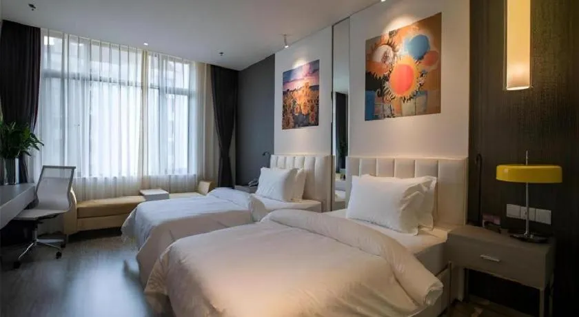 Bed in Jinjiang Metropolo Hotel Shenyang Country Garden Datong Lake Subway Station Branch