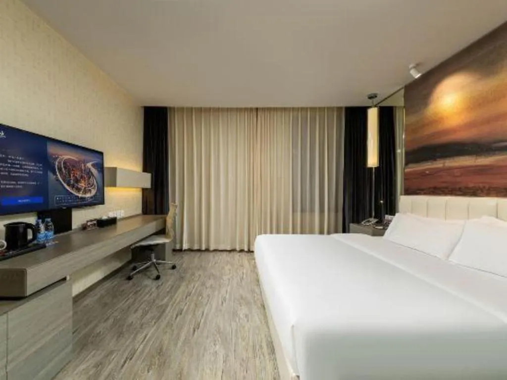 Bed in Jinjiang Metropolo Hotel Shenyang Country Garden Datong Lake Subway Station Branch