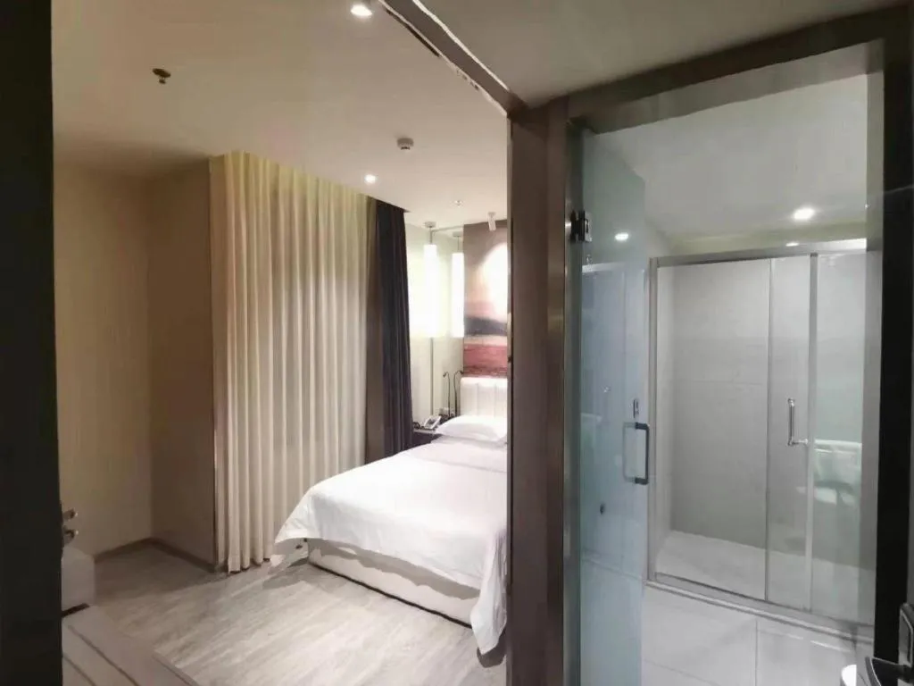 Bed in Jinjiang Metropolo Hotel Shenyang Country Garden Datong Lake Subway Station Branch