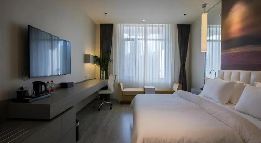 Bed in Jinjiang Metropolo Hotel Shenyang Country Garden Datong Lake Subway Station Branch