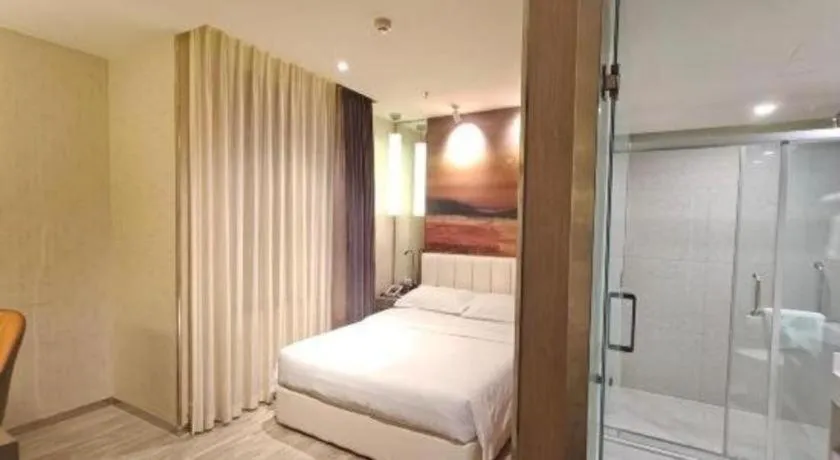 Bed in Jinjiang Metropolo Hotel Shenyang Country Garden Datong Lake Subway Station Branch
