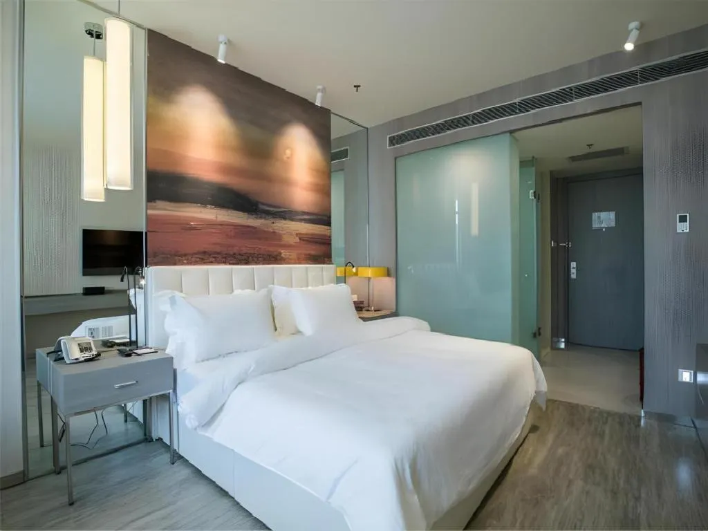 Bed in Jinjiang Metropolo Hotel Shenyang Country Garden Datong Lake Subway Station Branch