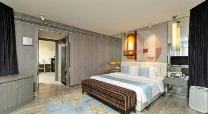 Bed in Jinjiang Metropolo Hotel Shenyang Country Garden Datong Lake Subway Station Branch