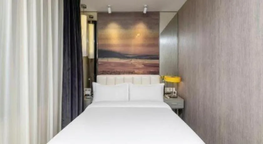 Bed in Jinjiang Metropolo Hotel Shenyang Country Garden Datong Lake Subway Station Branch