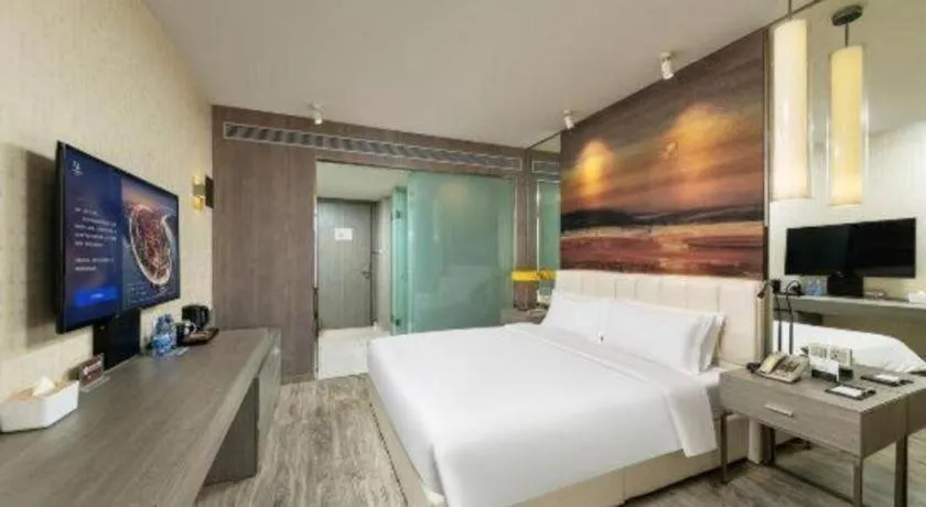 Bed in Jinjiang Metropolo Hotel Shenyang Country Garden Datong Lake Subway Station Branch