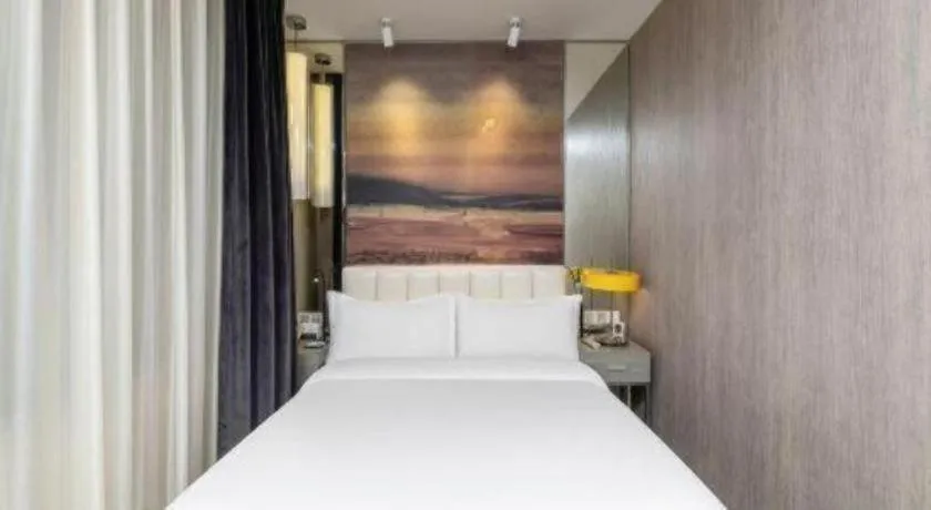 Bed in Jinjiang Metropolo Hotel Shenyang Country Garden Datong Lake Subway Station Branch