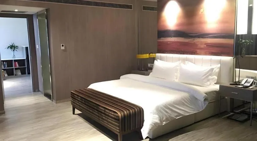 Bed in Jinjiang Metropolo Hotel Shenyang Country Garden Datong Lake Subway Station Branch