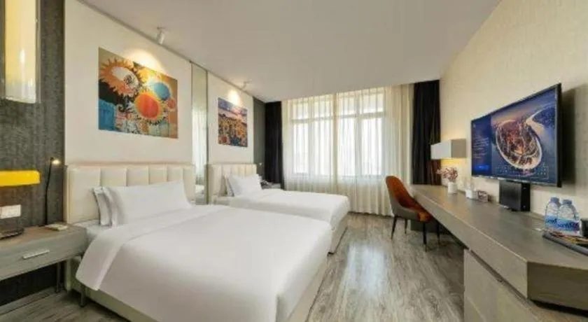 Bed in Jinjiang Metropolo Hotel Shenyang Country Garden Datong Lake Subway Station Branch