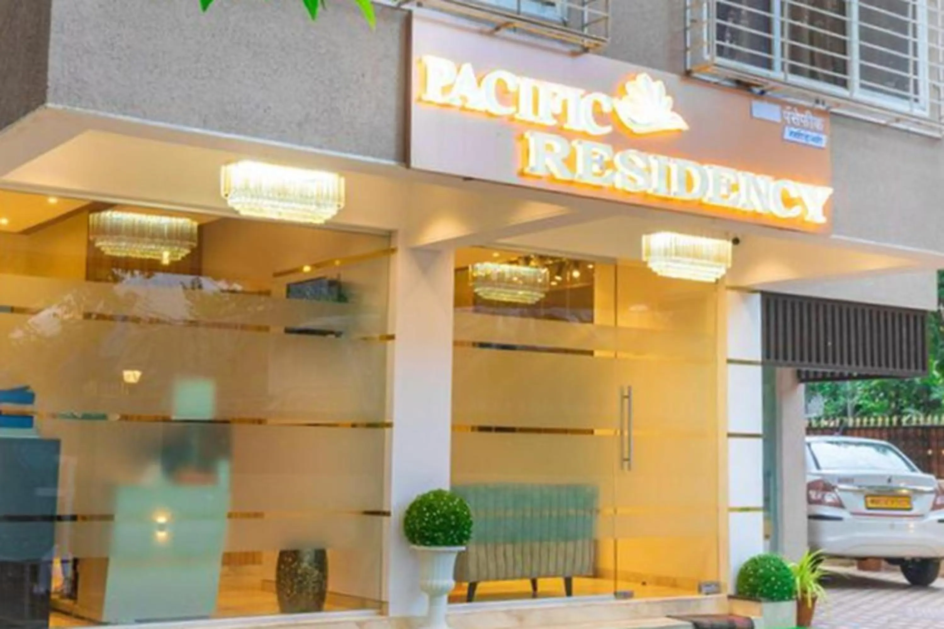 Property logo or sign in Hotel Pacific Residency