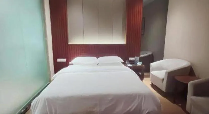 Bed in Santavan Hotel Shenzhen Guangming
