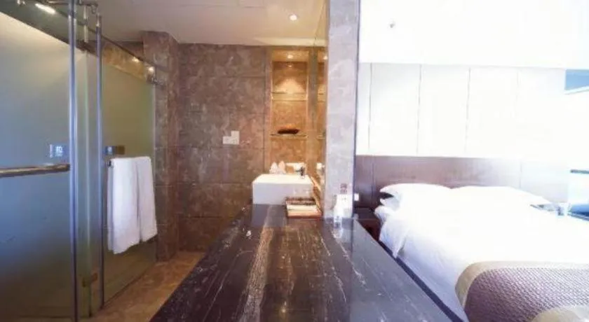 Bed in Santavan Hotel Shenzhen Guangming