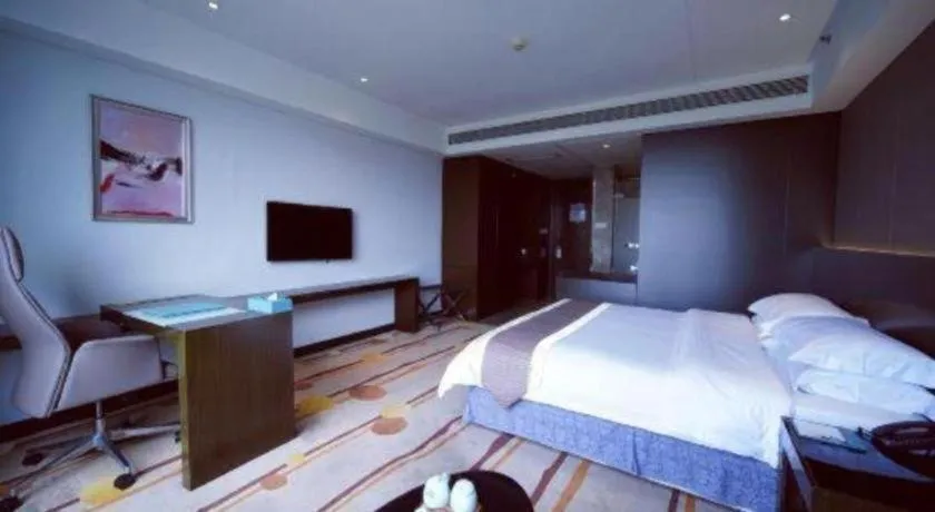 Bed in Santavan Hotel Shenzhen Guangming