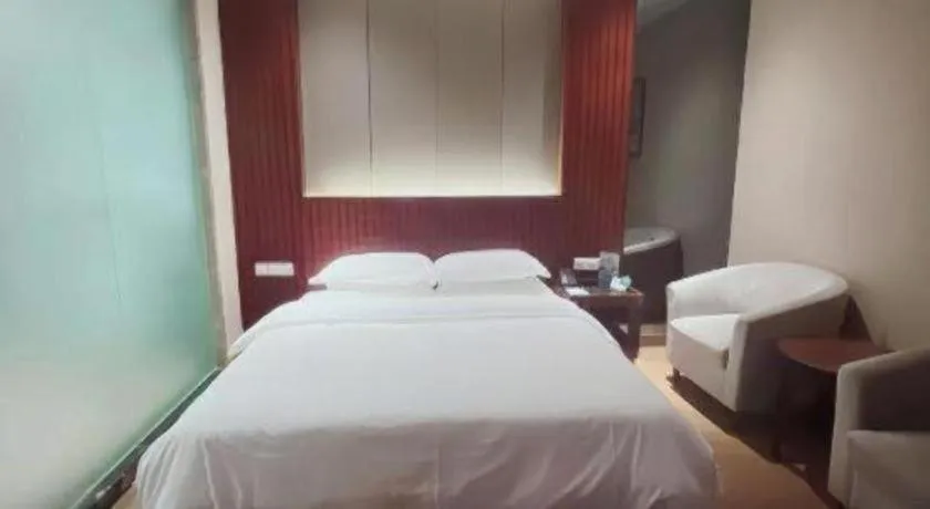 Bed in Santavan Hotel Shenzhen Guangming