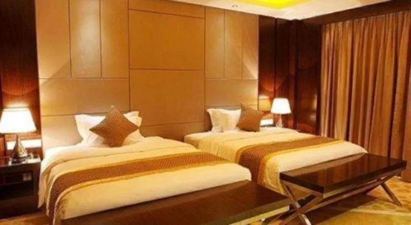 Bed in Santavan Hotel Shenzhen Guangming