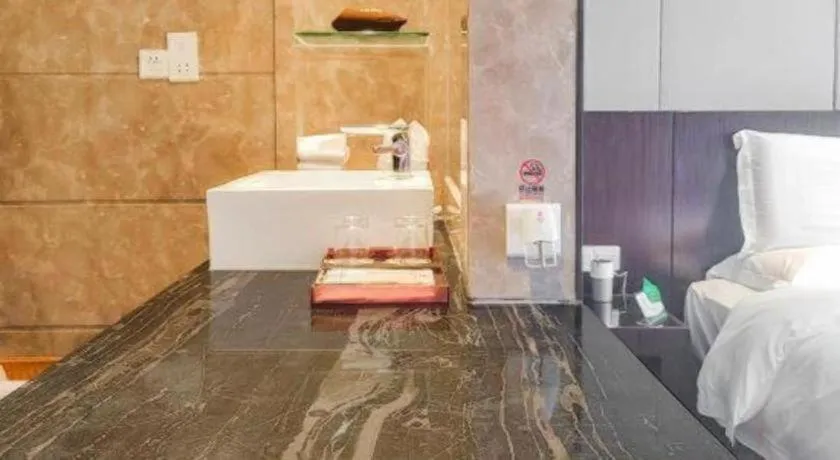 Bed in Santavan Hotel Shenzhen Guangming