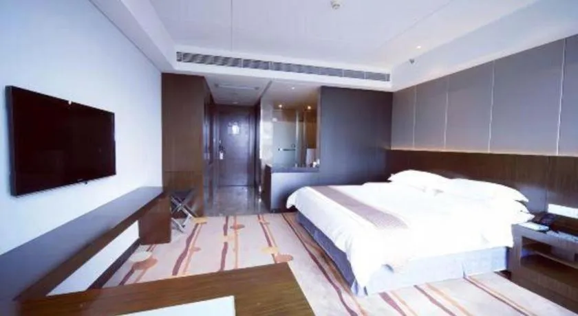 Bed in Santavan Hotel Shenzhen Guangming