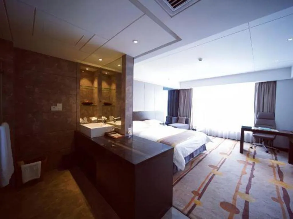 Bed in Santavan Hotel Shenzhen Guangming