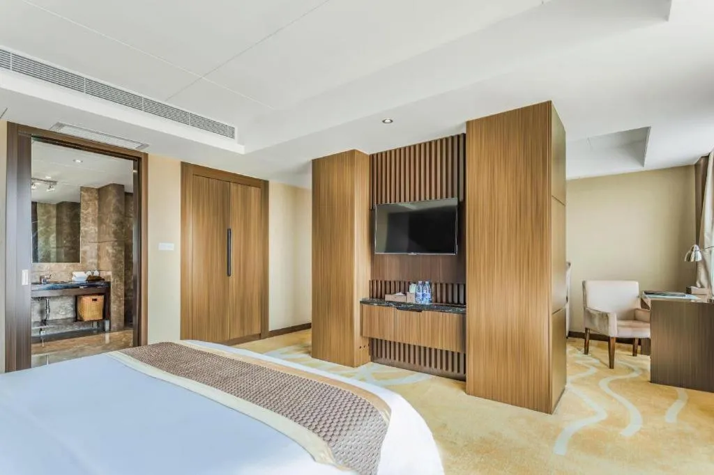 Bed in Santavan Hotel Shenzhen Guangming