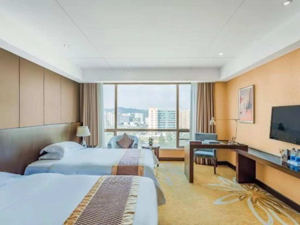 Bed in Santavan Hotel Shenzhen Guangming