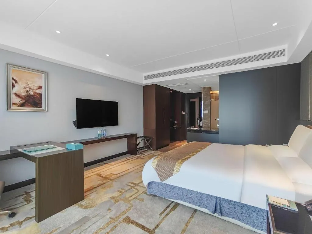 Bed in Santavan Hotel Shenzhen Guangming