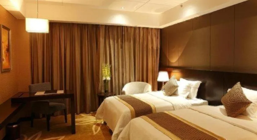 Bed in Santavan Hotel Shenzhen Guangming