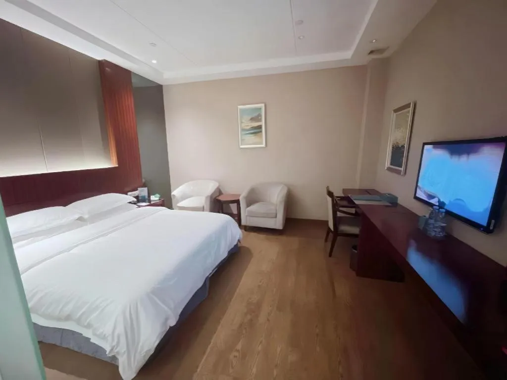 Bed in Santavan Hotel Shenzhen Guangming