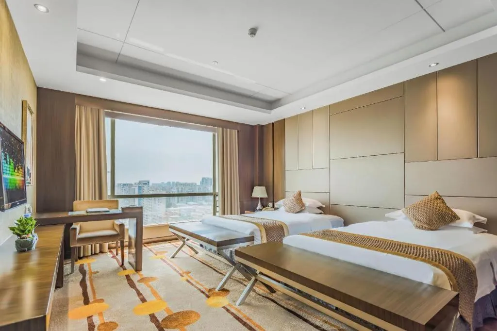 Bed in Santavan Hotel Shenzhen Guangming