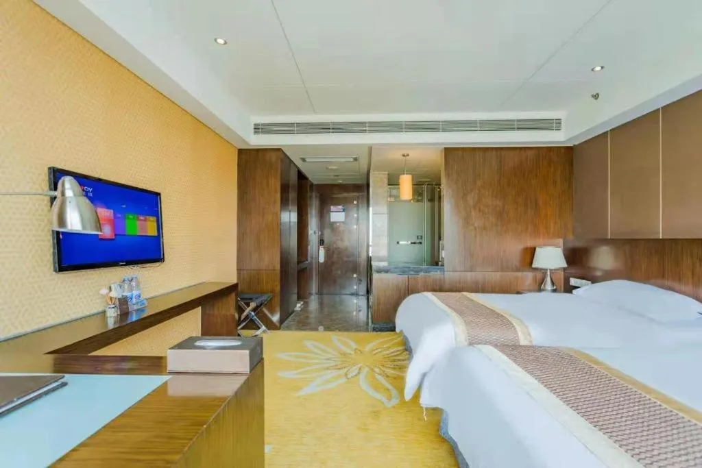 Bed in Santavan Hotel Shenzhen Guangming