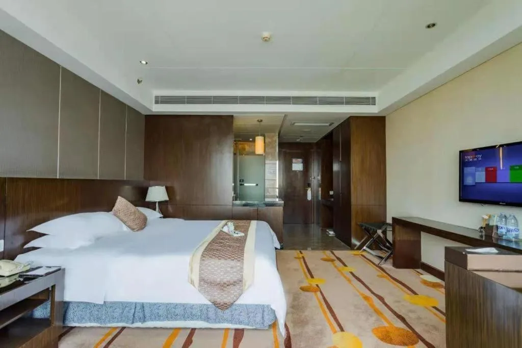 Bed in Santavan Hotel Shenzhen Guangming