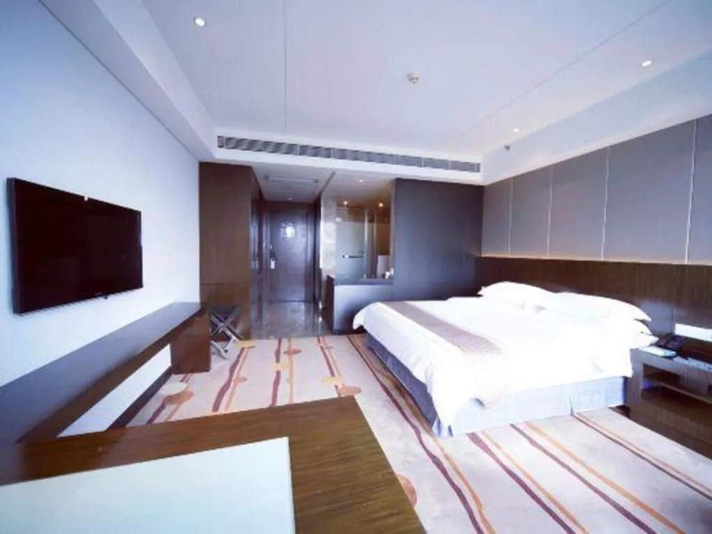 Bed in Santavan Hotel Shenzhen Guangming