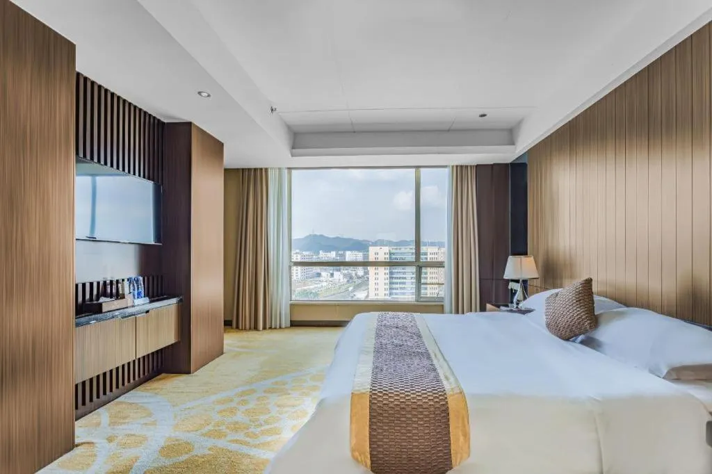 Bed in Santavan Hotel Shenzhen Guangming