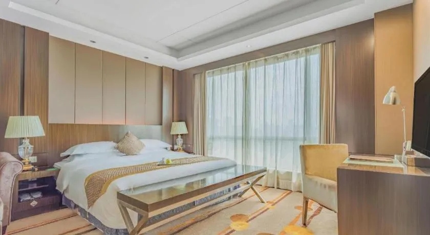 Bed in Santavan Hotel Shenzhen Guangming