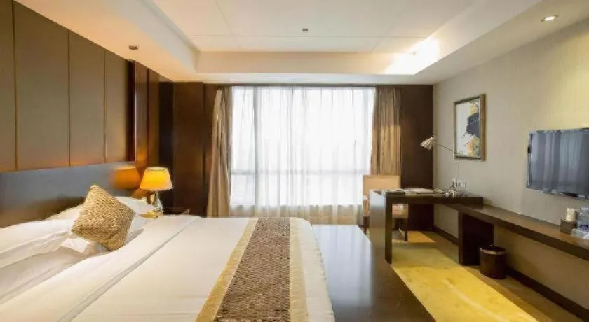 Bed in Santavan Hotel Shenzhen Guangming