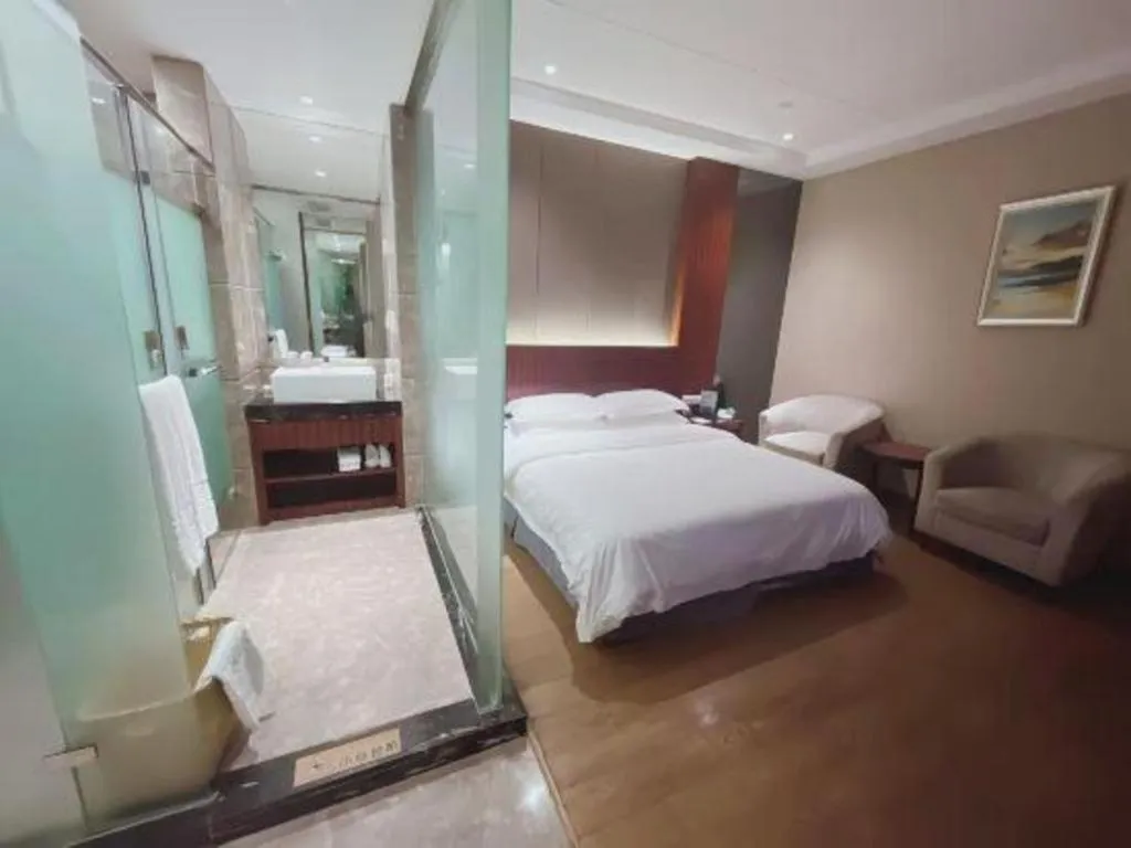 Bed in Santavan Hotel Shenzhen Guangming