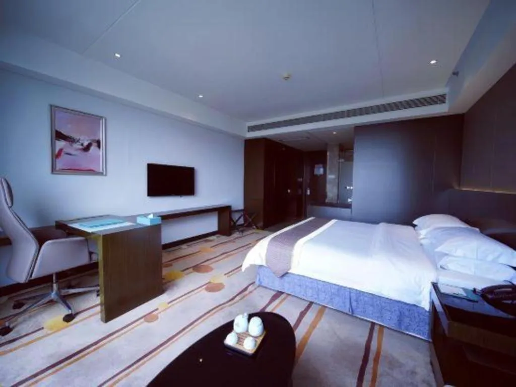 Bed in Santavan Hotel Shenzhen Guangming