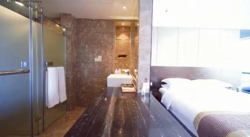 Bed in Santavan Hotel Shenzhen Guangming