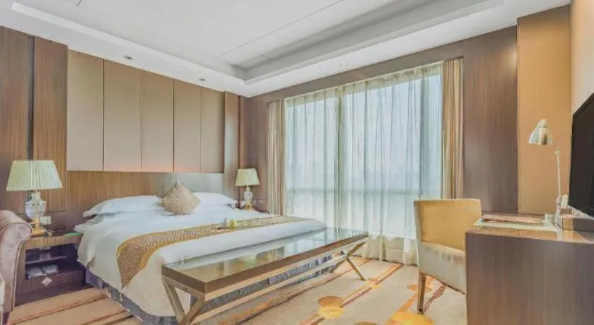 Bed in Santavan Hotel Shenzhen Guangming