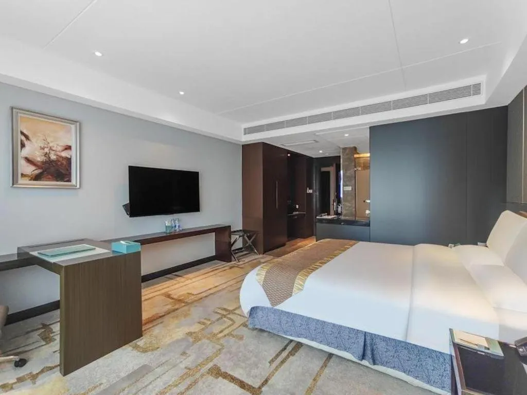 Bed in Santavan Hotel Shenzhen Guangming